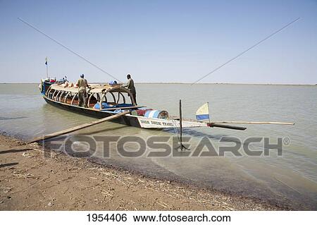 Stock Photograph - Pinasse On The Niger River, Sebi, Mali. Fotosearch