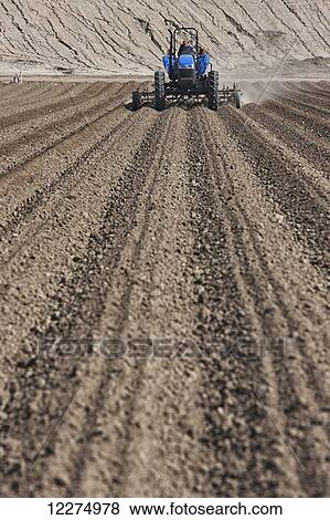 Ploughing field to ready for crops; Salinas, California, United States of America View Large Photo Image Stock Photo - Ploughing field to ready for crops; Salinas, California, United States of America. Fotosearch