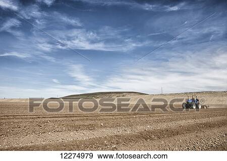 Ploughing field to ready for crops; Salinas, California, United States of America View Large Photo Image Stock Photo - Ploughing field to ready for crops; Salinas, California, United States of America. Fotosearch