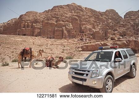 Stock Image - Police security along the colonnaded street; Petra, Jordan. Fotosearch