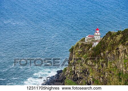 Stock Photograph - Ponta do Arnel lighthouse; Sao Miguel, Azores, Portugal. Fotosearch