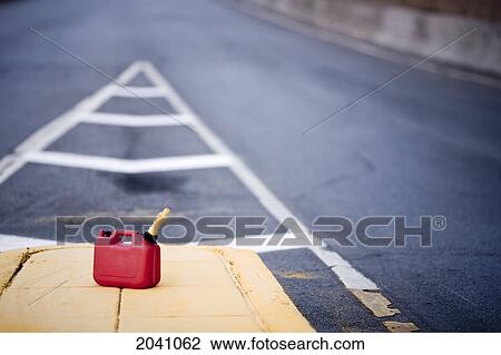 Stock Image - Portable Plastic Gas Can At The Entrance Of A Highway On Ramp, Montreal, Quebec. Fotosearch