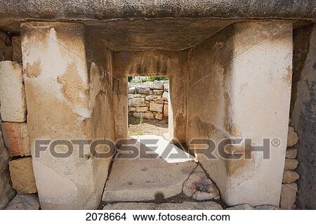 Porthole In A Trilithon In The First Apse Of The Middle Temple, Tarxien Temples, Malta View Large Photo Image Picture - Porthole In A Trilithon In The First Apse Of The Middle Temple, Tarxien Temples, Malta. Fotosearch