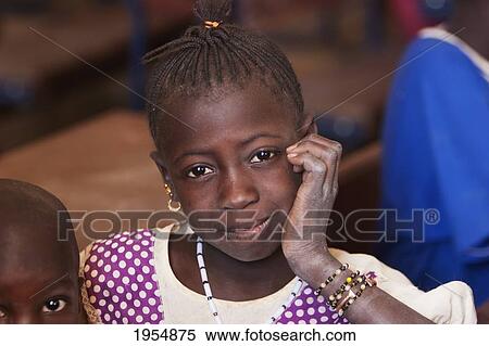 Portrait of a Girl at school in Sebi, Mali View Large Photo Image Stock Photography - Portrait of a Girl at school in Sebi, Mali. Fotosearch