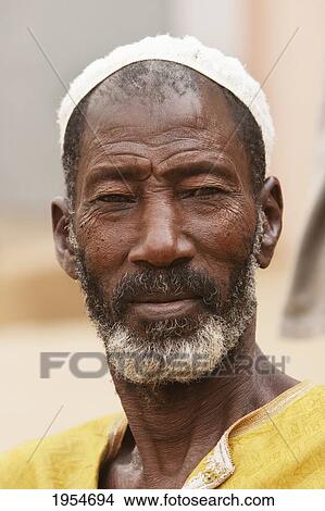 Portrait of a Malian man in Segou, Mali View Large Photo Image Picture - Portrait of a Malian man in Segou, Mali. Fotosearch