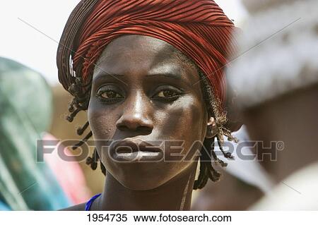 Portrait of a woman at the Monday Market in Djenne, Mali View Large Photo Image Stock Photography - Portrait of a woman at the Monday Market in Djenne, Mali. Fotosearch