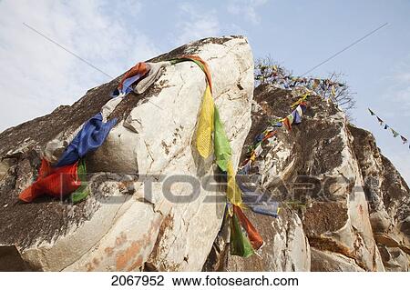 Stock Image - Prayer Flags On Gridhrakuta Hill, Rajgir, Bihar, India. Fotosearch
