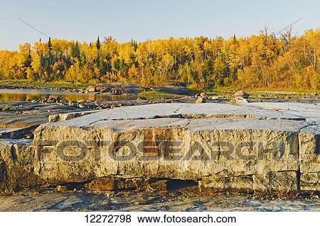 Precambrian Shield rock along the Winnipeg River near Seven Sisters; Manitoba, Canada View Large Photo Image Stock Photo - Precambrian Shield rock along the Winnipeg River near Seven Sisters; Manitoba, Canada. Fotosearch
