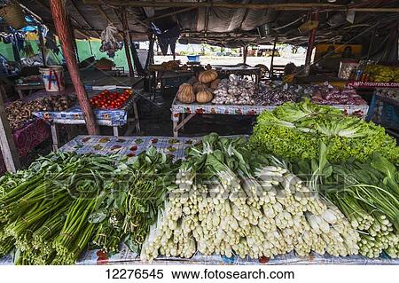 Stock Photography - Produce for sale at the Largo de Lecidere market; Dili, East Timor. Fotosearch