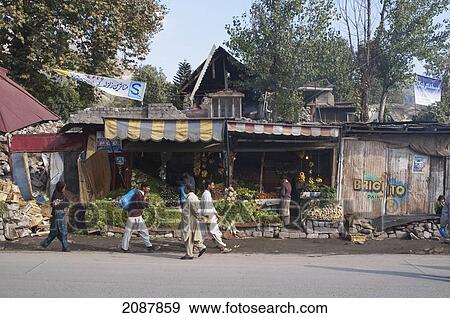 Stock Photo - Produce Store In The Bazaar Damaged By The 8 October 2005 Earthquake, Muzaffarabad, Azad Kashmir, Pakistan. Fotosearch