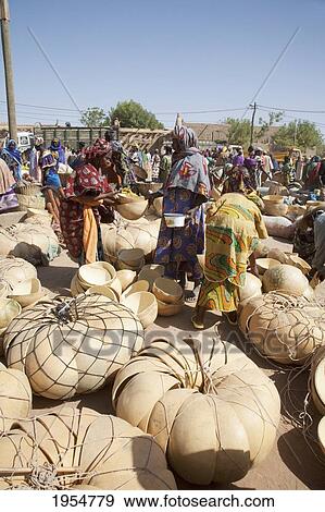 Pumpkin vessels for sales at the Monday Market, Djenne, Mali View Large Photo Image Stock Photo - Pumpkin vessels for sales at the Monday Market, Djenne, Mali. Fotosearch