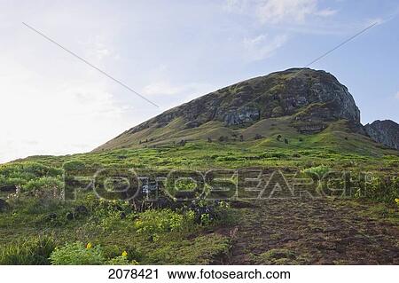 Quarry Of The Moais With Many Uncompleted Statues On The Outer Slope Of The Rano Raraku Volcano, Rapa Nui (Easter Island), Chile View Large Photo Image Stock Image - Quarry Of The Moais With Many Uncompleted Statues On The Outer Slope Of The Rano Raraku Volcano, Rapa Nui (Easter Island), Chile. Fotosearch