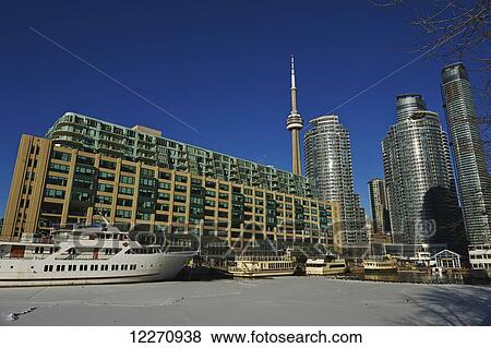 Stock Photo - Queens Quay harbourfront in winter; Toronto, Ontario, Canada. Fotosearch