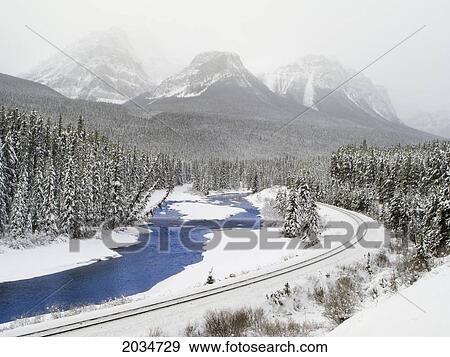 Stock Photo - Railroad Tracks At Morant's Curve Along The Bow River, Banff National Park, Alberta. Fotosearch