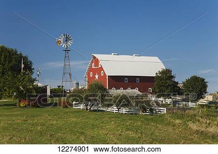 Red barn and windmill at a farm, near Edgewood; Iowa, United States of America View Large Photo Image Stock Image - Red barn and windmill at a farm, near Edgewood; Iowa, United States of America. Fotosearch