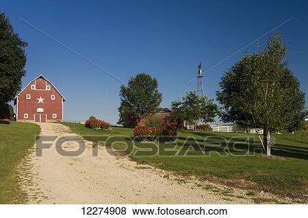 Red barn and windmill at a farm, near Edgewood; Iowa, United States of America View Large Photo Image Stock Photo - Red barn and windmill at a farm, near Edgewood; Iowa, United States of America. Fotosearch