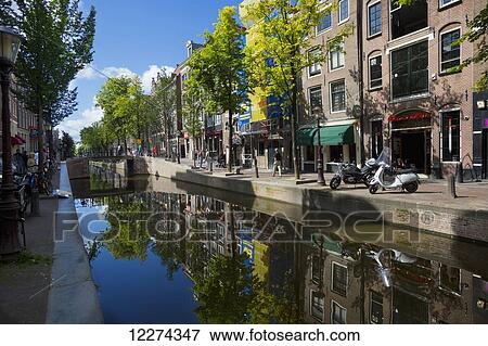 Reflections of buildings in a canal; Amsterdam, Holland View Large Photo Image Stock Photo - Reflections of buildings in a canal; Amsterdam, Holland. Fotosearch