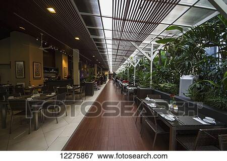 Restaurant of the Eastparc Hotel, Yogyakarta, Java Island, Indonesia View Large Photo Image Stock Photo - Restaurant of the Eastparc Hotel, Yogyakarta, Java Island, Indonesia. Fotosearch