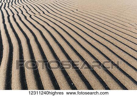 Stock Photograph - Ripples in the sand. Fotosearch