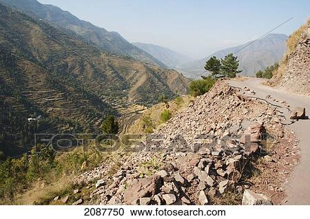 Stock Image - Road Destroyed By The 8 October 2005 Earthquake, Chikar, Azad Kashmir, Pakistan. Fotosearch
