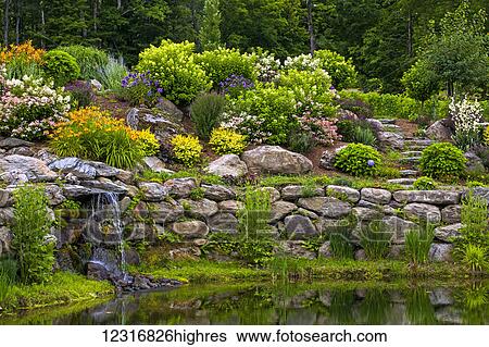 Stock Photograph - Rock garden and small waterfall; Knowlton, Quebec, Canada. Fotosearch