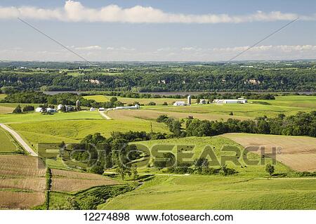 Rolling hills of farmland along the Mississippi River, near Balltown; Iowa, United States of America View Large Photo Image Stock Photo - Rolling hills of farmland along the Mississippi River, near Balltown; Iowa, United States of America. Fotosearch