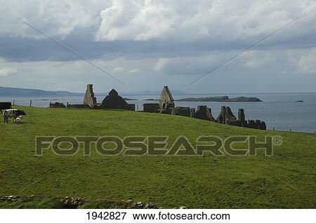 Stock Photo - Ruins Of Dunluce Castle, Northern Ireland, United Kingdom. Fotosearch