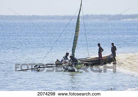 Sail Boat By The Beach In Ifaty, Toliara Province, Madagascar View Large Photo Image Stock Photo - Sail Boat By The Beach In Ifaty, Toliara Province, Madagascar. Fotosearch