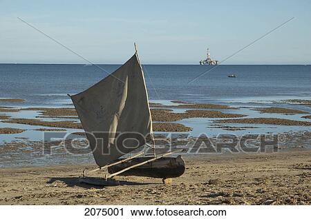 Stock Image - Sail Boat On The Beach In Mangily, Toliara Province, Madagascar. Fotosearch