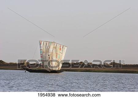 Stock Photo - Sail boat on the Niger River between Lake Debo and Sebi, Mali. Fotosearch