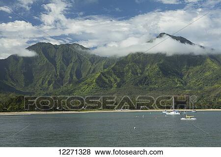 Stock Photo - Sailboats and Hanalei Beach in the bay and valley; Hanalei, Kauai, Hawaii, United States of America. Fotosearch