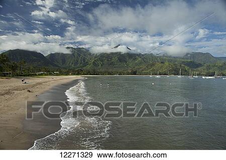 Stock Photo - Sailboats and Hanalei Beach in the bay and valley; Hanalei, Kauai, Hawaii, United States of America. Fotosearch