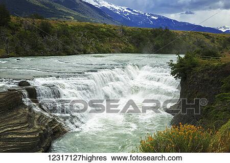 Stock Photograph - Salto Grande (Big Falls) of Torres del Paine National Park in Chilean Patagoia; Magallanes, Chile. Fotosearch