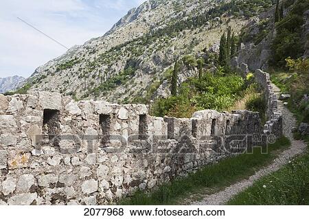 Stock Photo - San Giovanni Fortress Surrounds The Town Of Kotor. The Walls Surrounding The Town Are 5 Kilometers Long And Can Be Up To Twenty Meters Tall., Monte. Fotosearch