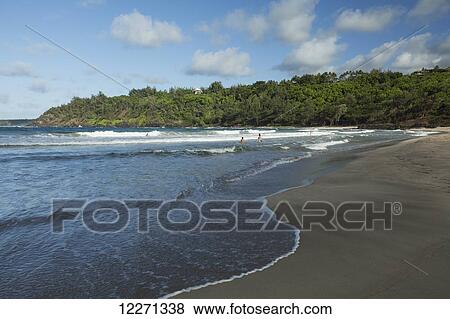 Sand and surf at Kalihi Beach, near Kilauea; Kauai, Hawaii, United States of America View Large Photo Image Stock Photo - Sand and surf at Kalihi Beach, near Kilauea; Kauai, Hawaii, United States of America. Fotosearch