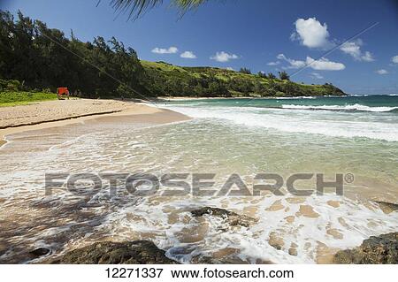 Sand, surf, white water at an isolated beach, Moloaa Beach and Bay; Kauai, Hawaii, United States of America View Large Photo Image Stock Photo - Sand, surf, white water at an isolated beach, Moloaa Beach and Bay; Kauai, Hawaii, United States of America. Fotosearch