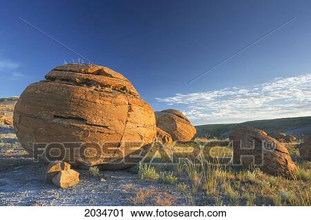 Sandstone Concretions At Red Rock Coulee Natural Area Near Seven Persons, Alberta View Large Photo Image Stock Image - Sandstone Concretions At Red Rock Coulee Natural Area Near Seven Persons, Alberta. Fotosearch