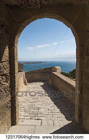 Stock Photograph - Santa Barbara Castle from Alicante, a fortress built at the end of eleventh century by Muslims; Alicante, Valencia, Spain. Fotosearch