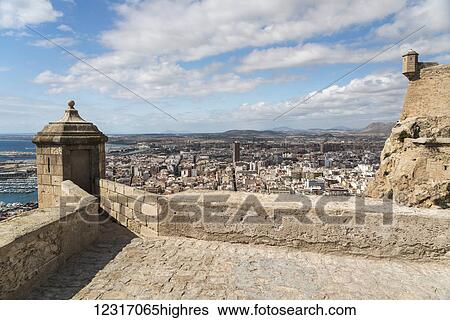 Stock Photograph - Santa Barbara Castle from Alicante, a fortress built at the end of eleventh century by Muslims; Alicante, Valencia, Spain. Fotosearch