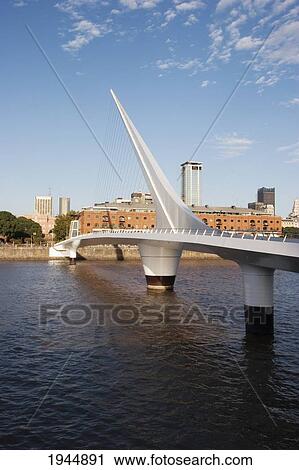 Santiago Calatrava's Puente De La Mujer (Women's Bridge) In Puerto Madero, Buenos Aires, Capital Federal, Argentina View Large Photo Image Stock Image - Santiago Calatrava's Puente De La Mujer (Women's Bridge) In Puerto Madero, Buenos Aires, Capital Federal, Argentina. Fotosearch
