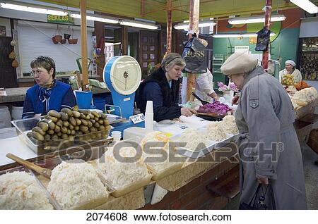 Sauerkraut Vendor At The Central Market Housed In Reconditioned Zeppelin Hangars, Riga, Latvia View Large Photo Image Stock Photo - Sauerkraut Vendor At The Central Market Housed In Reconditioned Zeppelin Hangars, Riga, Latvia. Fotosearch
