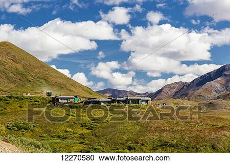 Stock Image - Scenic view of Eielson Visitor Center and green tundra in Denali National Park, Interior Alaska, Summer, USA.. Fotosearch