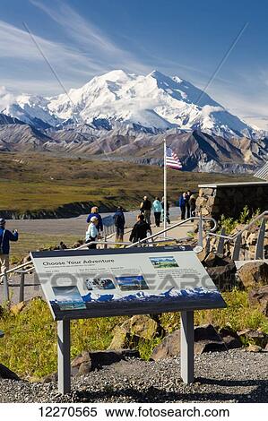 Scenic view of Mt. McKinley from Eielson Visitor Center with a visitor information board in the foreground in Denali National Park, Interior Alaska, Summer, USA. View Large Photo Image Stock Photography - Scenic view of Mt. McKinley from Eielson Visitor Center with a visitor information board in the foreground in Denali National Park, Interior Alaska, Summer, USA.. Fotosearch