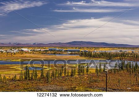 Scenic view of the village of Noatak and the surrounding wetlands, tundra, and Baird Mountains in the distance, Arctic Alaska, Summer View Large Photo Image Stock Image - Scenic view of the village of Noatak and the surrounding wetlands, tundra, and Baird Mountains in the distance, Arctic Alaska, Summer. Fotosearch