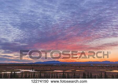 Scenic view of the village of Noatak with the Baird Mountains in the distance at sunrise, Arctic Alaska, USA, Autumn View Large Photo Image Stock Image - Scenic view of the village of Noatak with the Baird Mountains in the distance at sunrise, Arctic Alaska, USA, Autumn. Fotosearch