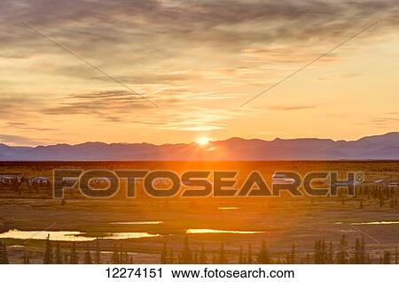 Scenic view of the village of Noatak with the Baird Mountains in the distance at sunrise, Arctic Alaska, USA, Autumn View Large Photo Image Stock Image - Scenic view of the village of Noatak with the Baird Mountains in the distance at sunrise, Arctic Alaska, USA, Autumn. Fotosearch