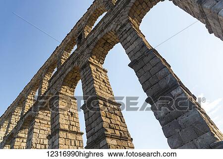 Segovia's Aqueduct is one of the architectural symbols of Spain, built in the 2nd Century A. D; Segovia city, Castilla Leon, Spain View Large Photo Image Stock Photograph - Segovia's Aqueduct is one of the architectural symbols of Spain, built in the 2nd Century A. D; Segovia city, Castilla Leon, Spain. Fotosearch
