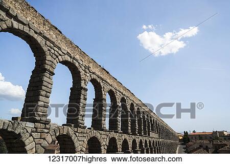 Segovia's Aqueduct is one of the architectural symbols of Spain, built in the 2nd Century A. D; Segovia city, Castilla Leon, Spain View Large Photo Image Stock Photograph - Segovia's Aqueduct is one of the architectural symbols of Spain, built in the 2nd Century A. D; Segovia city, Castilla Leon, Spain. Fotosearch