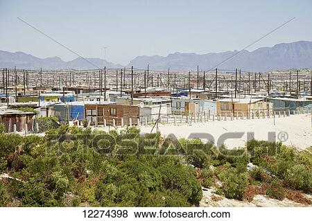 Stock Photo - Shanty homes in Khayelitsha township, Cape Flats; Cape Town, South Africa. Fotosearch