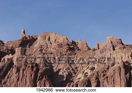 Stock Photograph - Sharh-E-Zohak (The Red City) And Its Elaborate Towers Guarded The Entrance To Bamiyan During The Reigns Of The Shansabani Kings In The 12Th And 13Th Centuries., Bamian Province, Afghanistan. Fotosearch